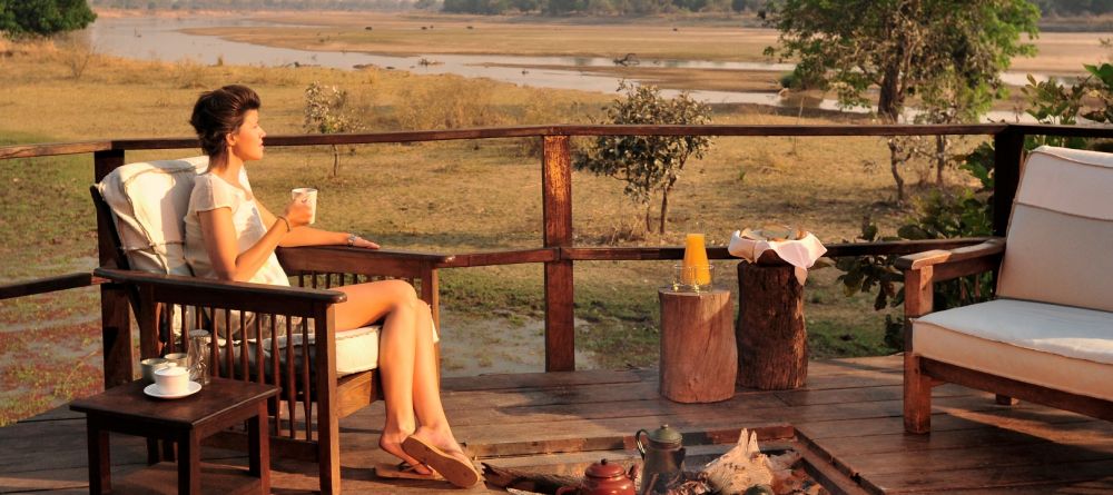 Relaxation on the deck at Kakuli Bush Camp, South Luangwa National Park, Zambia - Image 3