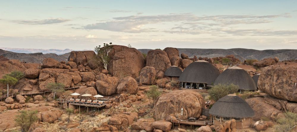 The unique architecture blends well with the rounded boulders at Mowani Mountain Camp, Damaraland, Namibia - Image 1