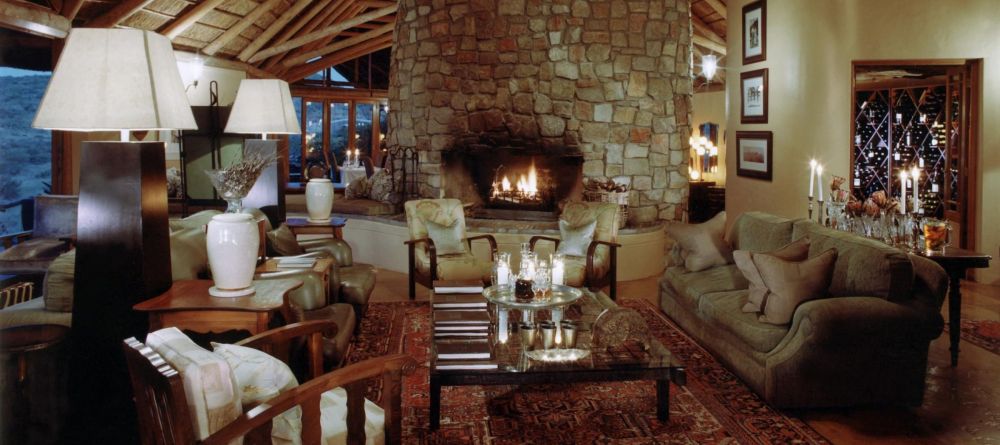 The main lounge has a rustic elegance at Kwandwe River Lodge, Kwandwe Private Game Reserve, South Africa - Image 3