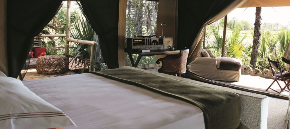 A double tent with elegant African-inspired decor at Chem Chem Lodge, Lake Manyara National Park, Tanzania - Image 2