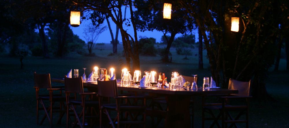 Outdoor evening dining at Richard's Camp, Masai Mara National Reserve, Kenya - Image 11