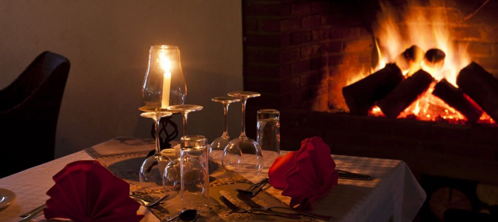 Romantic fireside dining at Kitela Lodge and African Spa, Karatu, Tanzania - Image 3