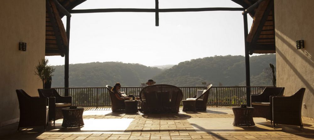 Sit on the veranda overlooking the valley at Kitela Lodge and African Spa, Karatu, Tanzania - Image 4