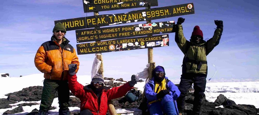 Kili climbers summit - Image 2