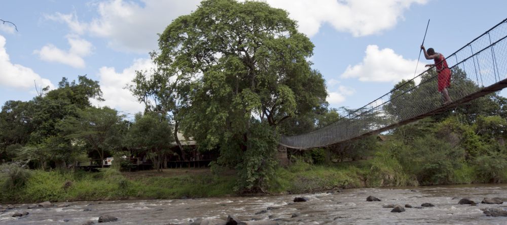 Swinging bridge over the river at Ngare Serian Camp, Masai Mara National Reserve, Kenya - Image 19