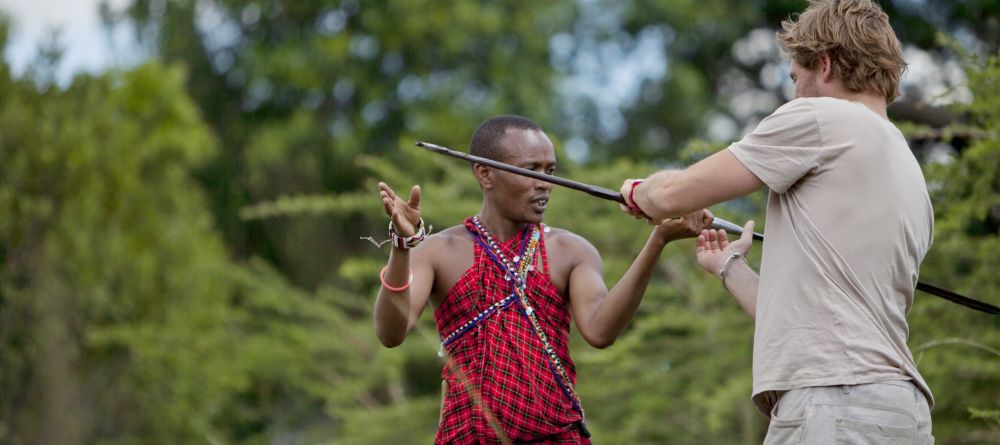 Learning to throw a spear from the Maasai tribesmen at Ngare Serian Camp, Masai Mara National Reserve, Kenya - Image 2