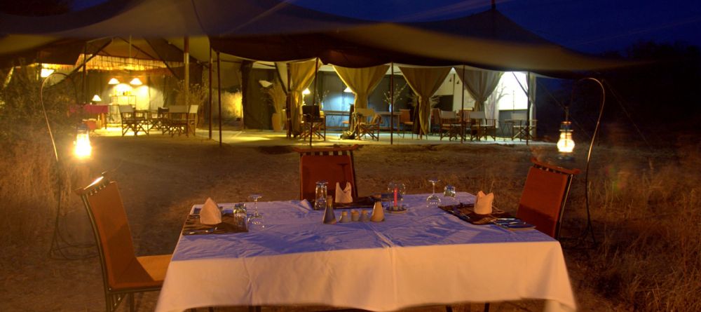 Outdoor dining at Kwihala Camp, Ruaha National Park, Tanzania - Image 1