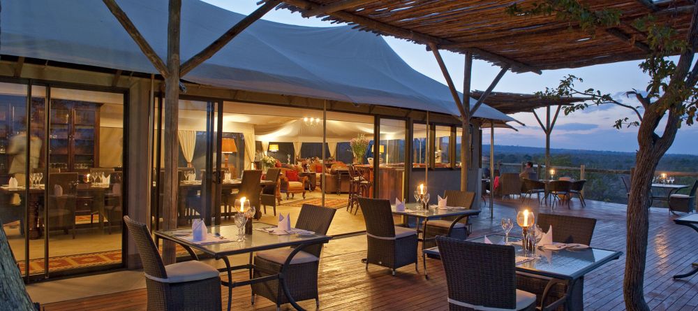 Outdoor dining deck at The Elephant Camp, Victoria Falls, Zimbabwe - Image 1