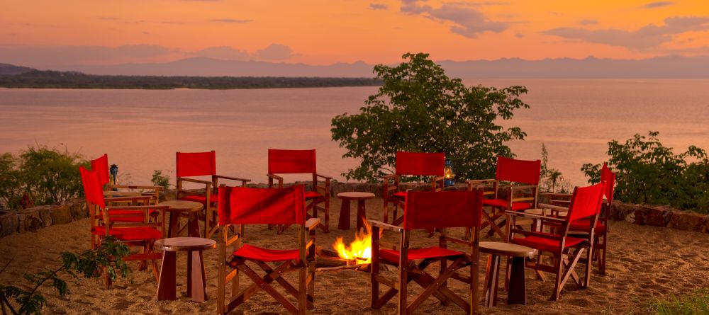 Campfires in the evening at Pumulani, Lake Malawi, Malawi - Image 16