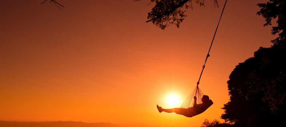 A moment of solitude and peace at sunset at Pumulani, Lake Malawi, Malawi - Image 5