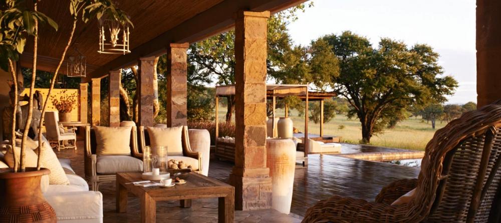 Watch the sunset over the savannah at Singita Serengeti House, Serengeti Grumeti Reserves, Tanzania - Image 9