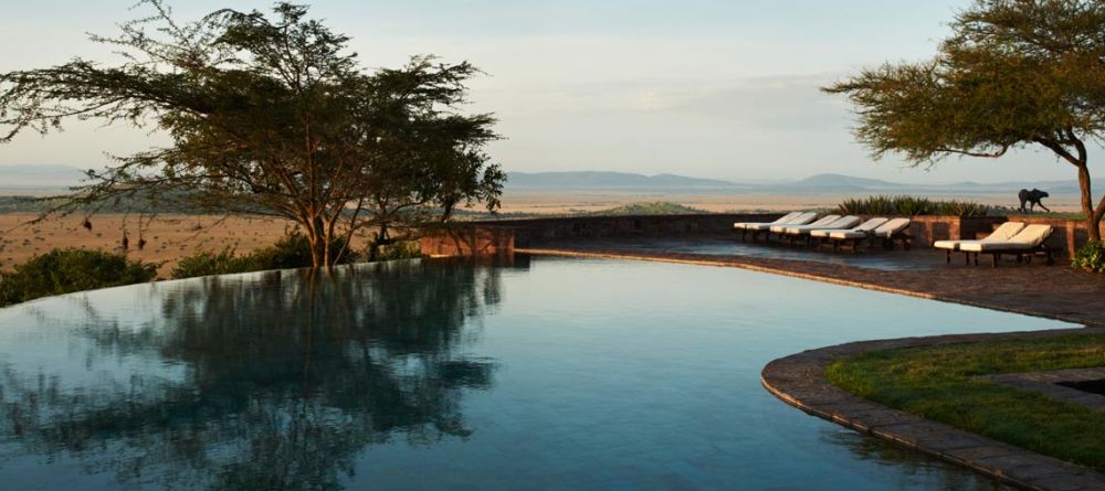 Relax by the pool and enjoy the stunning vistas at Singita Sasakwa Lodge, Grumeti Reserves, Tanzania - Image 5