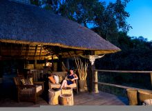 Relaxation on the deck at Kakuli Bush Camp, South Luangwa National Park, Zambia