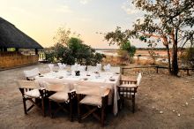 Outdoor dining at Kakuli Bush Camp, South Luangwa National Park, Zambia