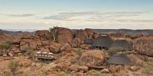 The unique architecture blends well with the rounded boulders at Mowani Mountain Camp, Damaraland, Namibia