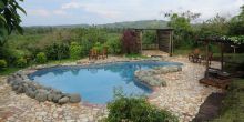 take a swim at Kyambura Gorge Lodge