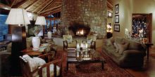 The main lounge has a rustic elegance at Kwandwe River Lodge, Kwandwe Private Game Reserve, South Africa