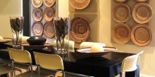 The dining room adorned with traditional weaved baskets at African Villa, Cape Town, South Africa