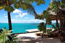 Beach relaxation at Paradise Cove Hotel and Spa, Anse la Raie, Mauritius