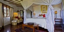 Bedroom at Kleins Camp, Serengeti National Park, Tanzania Â© AndBeyond