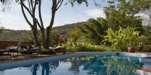 Relaxing by the pool at the Plantation Lodge, Karatu, Tanzania