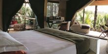 A double tent with elegant African-inspired decor at Chem Chem Lodge, Lake Manyara National Park, Tanzania