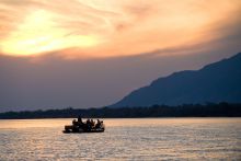 Boating at sunset at Chongwe River House, Lower Zambezi National Park, Zambia 