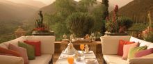 Elegant outdoor lounge at Kasbah Tamadot, Atlas Mountains, Morocco