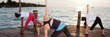 Unwind with yoga on the pier as the sun rises at Essque Zalu Zanzibar, Zanzibar, Tanzania