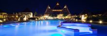 The pool illuminated at night at Essque Zalu Zanzibar, Zanzibar, Tanzania