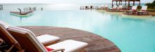 The infinity pool blends seamlessly with the Indian Ocean on the horizon at Essque Zalu Zanzibar, Zanzibar, Tanzania