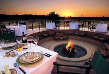 Outdoor dining around the fire at Mateya Safari Lodge, Madikwe Game Reserve, South Africa