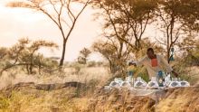 Dine in the African bush with elegant service and exquisite cuisine at The Four Seasons Safari Lodge, Serengeti National Park, Tanzania