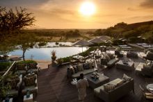 Relax in the sunshine on the spacious lounge deck while listening to the sounds of the Serengeti at The Four Seasons Safari Lodge, Serengeti National Park, Tanzania