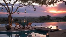 Share a private romantic dinner as the sun sets over the plains at The Four Seasons Safari Lodge, Serengeti National Park, Tanzania