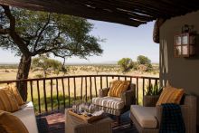 Enjoy refreshments while gazing over the plains from the private verandas at The Four Seasons Safari Lodge, Serengeti National Park, Tanzania