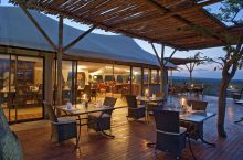 Outdoor dining deck at The Elephant Camp, Victoria Falls, Zimbabwe