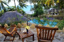 Take in the magnificent view of the ocean and swaying palm trees at Kinasi Lodge, Mafia Island, Tanzania