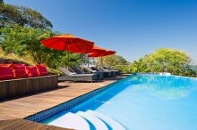 Enjoy the sun by the pool at Pumulani, Lake Malawi, Malawi