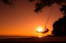 A moment of solitude and peace at sunset at Pumulani, Lake Malawi, Malawi