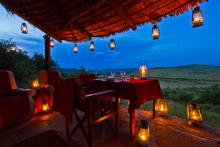 Romantic view of the serengeti for dinner at Kleins Camp, Serengeti National Park, Tanzania Â© AndBeyond