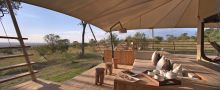 Watch the sun sink into the horizon from the comfort of private verandasr at Serengeti Bushtops Camp, Serengeti National Park, Tanzania