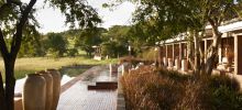 The infinity pool allows guests to enjoy the full effect of the Grumeti Reserves' natural beauty at Singita Serengeti House, Serengeti Grumeti Reserves, Tanzania