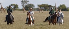 Experience a unique horseback safari ride at Singita Sasakwa Lodge, Grumeti Reserves, Tanzania