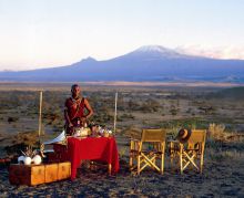 Sundowners in front of Mt Kilimanjaro- Tortilis Camp, Amboseli National Reserve, Kenya