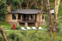 The buildings are nestled into the lush vegetation at The Emakoko, Nairobi National Park, Nairobi, Kenya