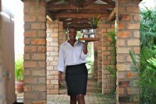 Waiter at Boma Lodge, Entebbe, Uganda