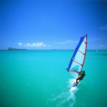 Wind surfing at Paradise Cove Hotel and Spa, Anse la Raie, Mauritius